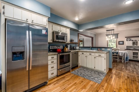 Kitchen opens to dining room