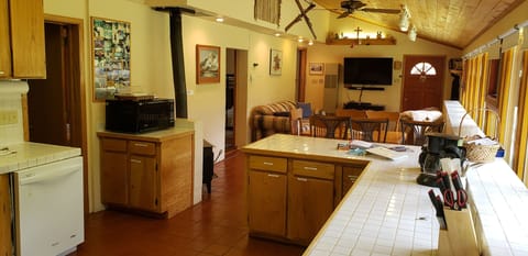 View of kitchen, dining and living room