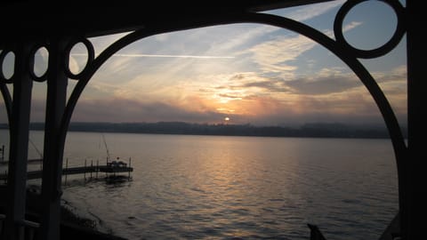 Watch the sunrise while enjoying a cup of coffee on the large covered porch