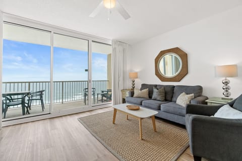 Large living area with ocean views and comfortable queen memory bed pullout