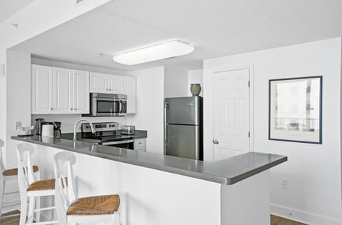 Gourmet kitchen equipped for cooking and dining needs