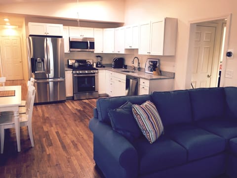 Bright and airy open floor plan cottage style unit