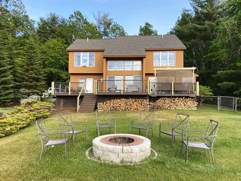 Fire pit with plenty of firewood for our guests