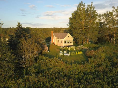 The cottage is in a small village, yet has a private lawn overlooking the ocean.
