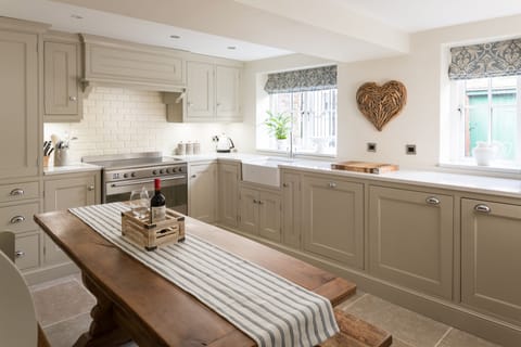 The Kitchen with antique refectory table & Smeg range cooker