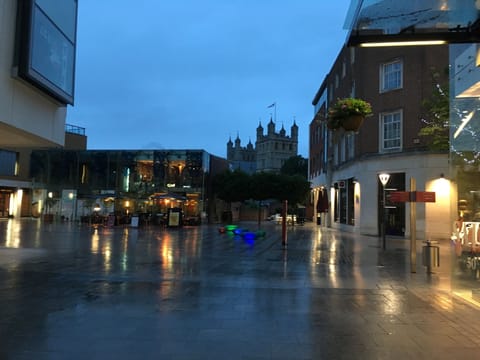 The apartment building at night with views over to Exeter Cathedral