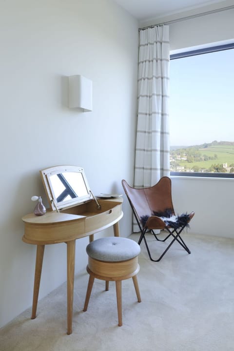The bedrooms have dressing tables / desks