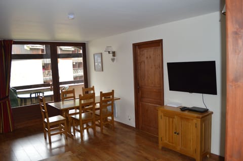Living area looking towards balcony ( door in photo is to main bedroom)

