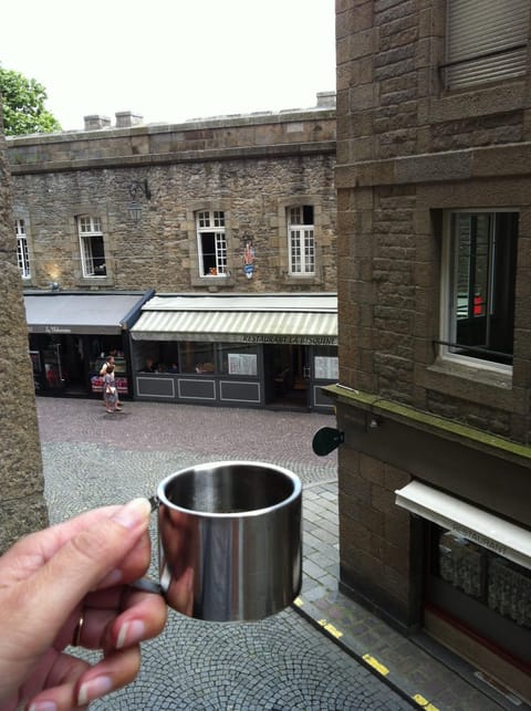 Have a coffee whilst contemplating the old town's battlements...