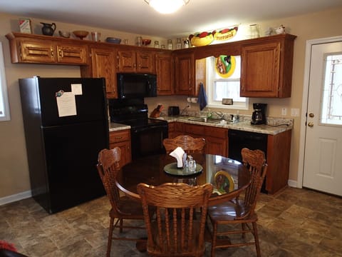 Kitchen with full appliances.