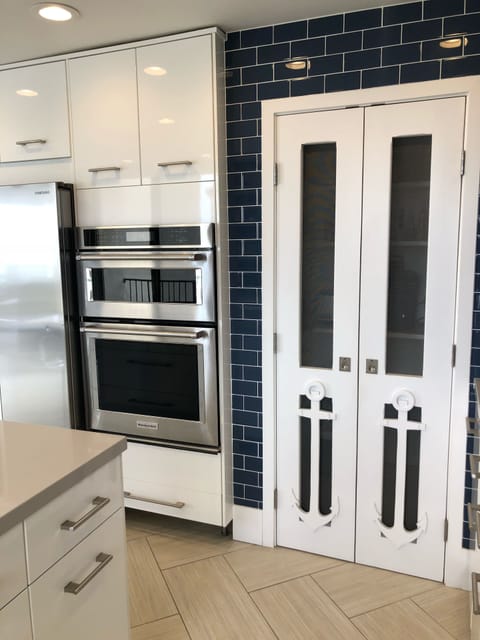 Your pantry is stocked with a Keruig,Ninja Blender, KitchenAid Mixer and toaster