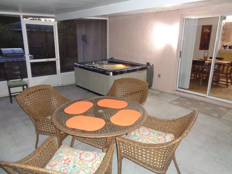 Relax in our screened lanai...