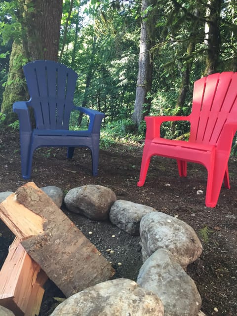 Fire pit overlooking Greenwater River. 