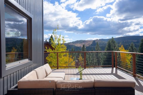 New back deck with patio furniture, West side