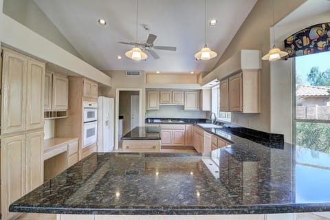 Kitchen bar has seating for 4