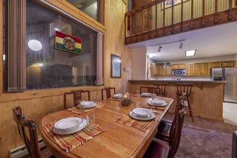 Dining Room looking out north window and towards kitchen bar