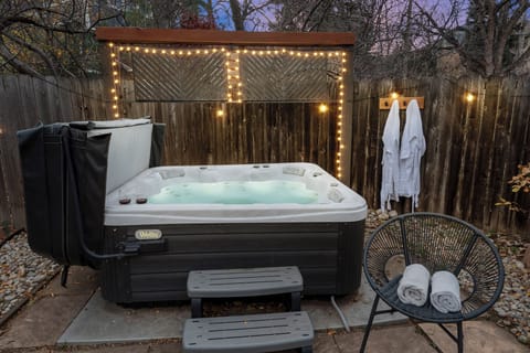 Hot Tub Oasis: Indulge in bubbly bliss under twinkling lights and serene views!