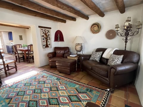 Living Room w/ wood-burning Kiva fireplace
