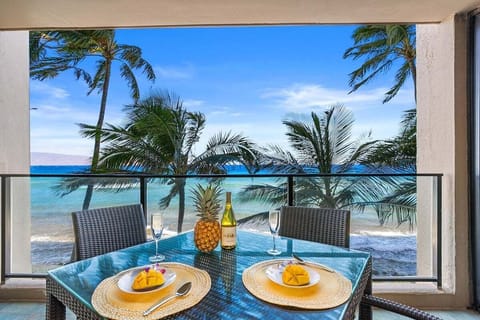 Relax on a private balcony overlooking the sparkling Pacific Ocean