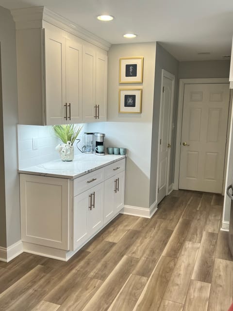 Coffee bar and empty cabinets for food storage/ pantry area