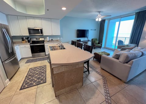 Kitchen and dining room, seats for at least eight guests.