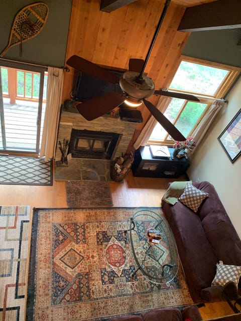 Spacious living area as seen from loft with 55” flatscreen tv