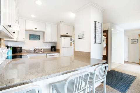 Bright new kitchen. Fully stocked with pots ,pans, dishes silverware 