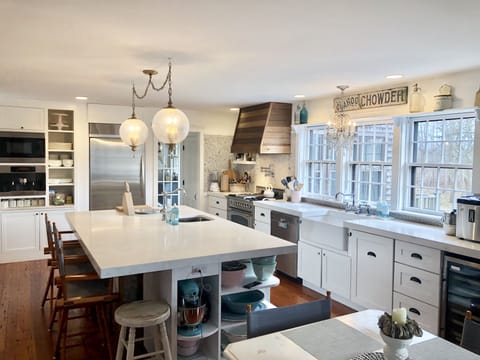 2 sinks, wine frig, ice maker, Kitchen Aid mixer, mic/speed oven, coffee maker