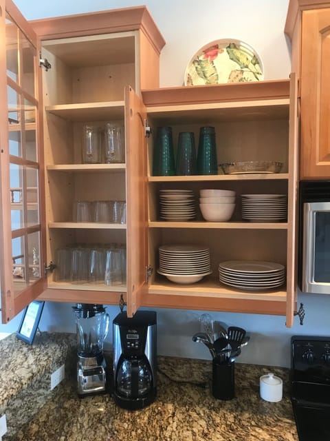 Plates, bowls, cups, silverware, pots, pans, etc. all provided