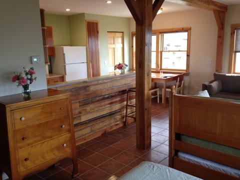 View of kitchen, dining and living areas.