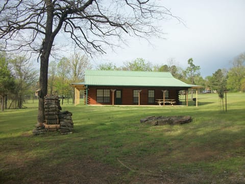 Fire pit in front yard Wood provided for fires