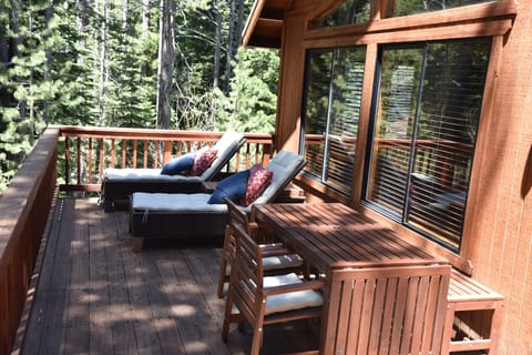 relax on the chaise lounges and enjoy the forest views