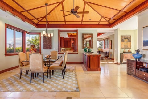 Host unforgettable meals in the open dining space that flows effortlessly into the kitchen and lanai.
