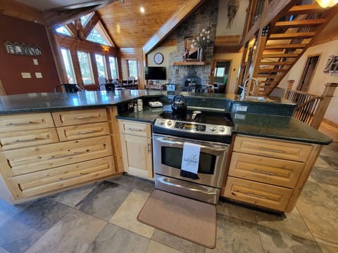 Kitchen looking into family room area