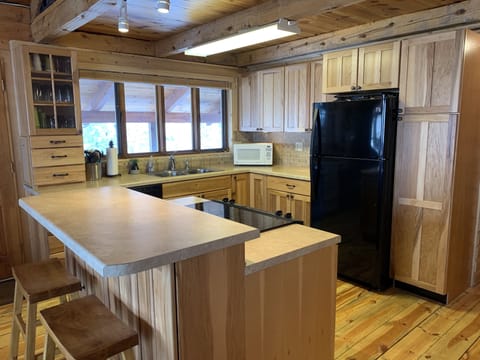 Main floor kitchen (fully stocked, kuerig coffee pot, stove, oven, mircrowave)