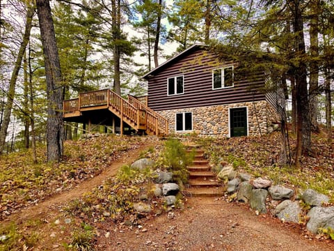 View from the driveway. A path to the right avoids the stairs.