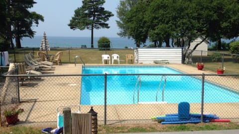 Fenced in pool off of the deck.