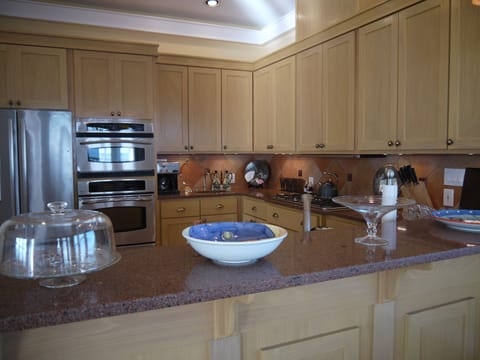 Gourmet chef dream kitchen. Gas grill, double oven, warming drawer