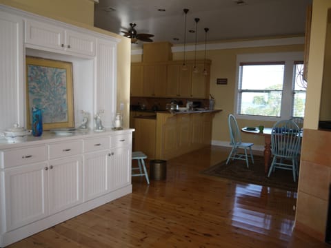View from sectional towards kitchen, dining...