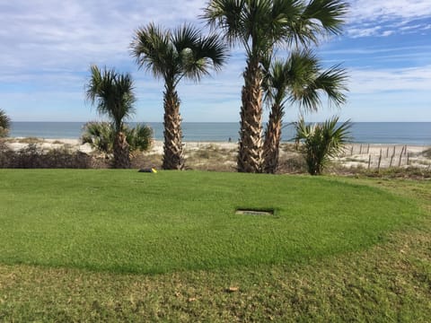 Patio overlooks # 16 tee of Long Point Golf Course and ocean