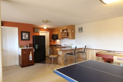 Wide view of kitchenette
