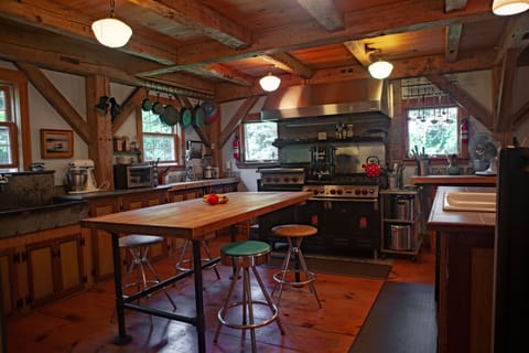 FULLY STOCKED KITCHEN WITH COMMERCIAL SIX BURNER STOVE 