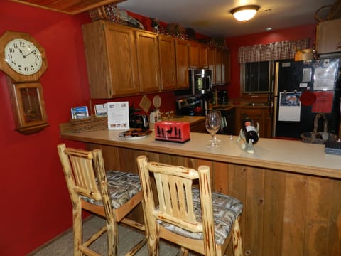 Western kitchen with stainless steel appliances and all the extras Big Sky Condo