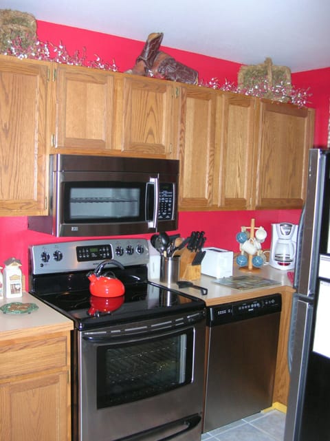 Modern kitchen with stainless steel appliances and all the extras Big Sky Condo
