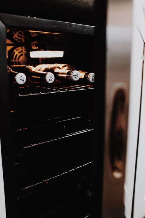 Temperature controlled beverage cooler. Great for saving space in refrigerator.