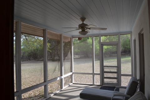 Porch opening off Bedroom 2 and living area.
