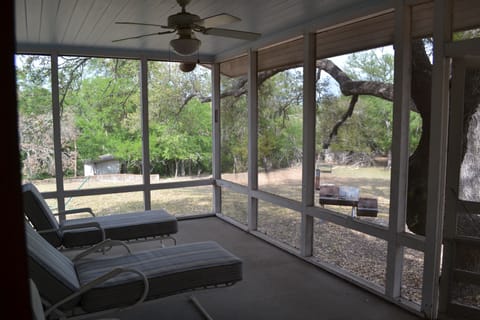 Porch off Bedroom 1/living area.  Porches have 2 very comfortable chaise lounges
