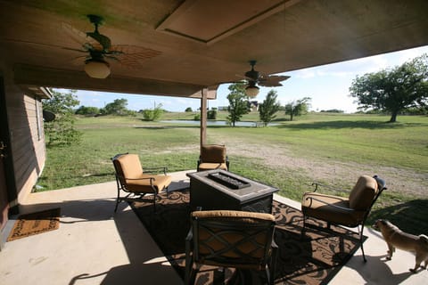 Comfortable Patio is ideal for watching sunsets around a plush gas firepit group