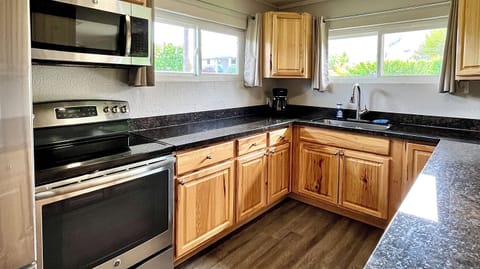 Kitchen with granite countertops and stainless steel appliances