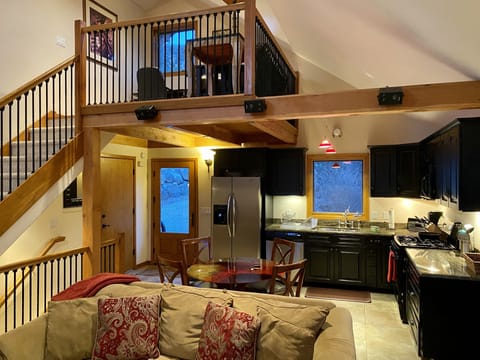 Loft/office area above kitchen. Sleeps up to 2.
